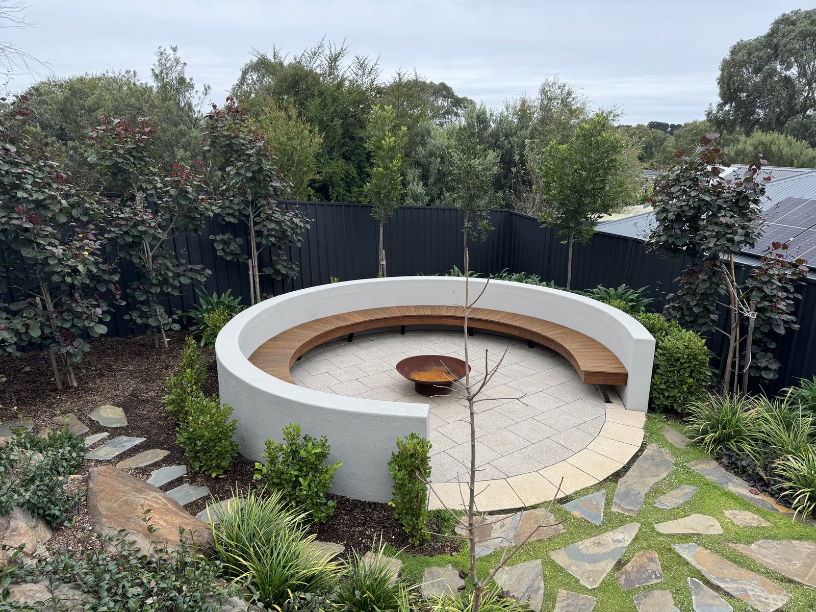 Custom firepit with hardwood seating in Aberfoyle Park