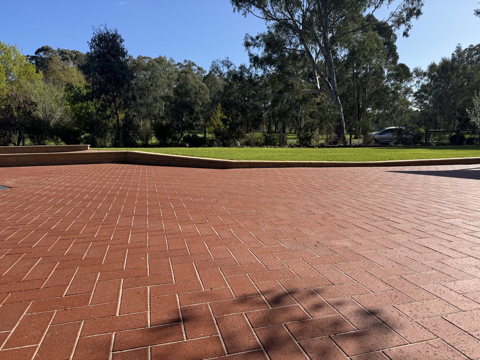 Large red herringbone brick paved area completed in Verdun